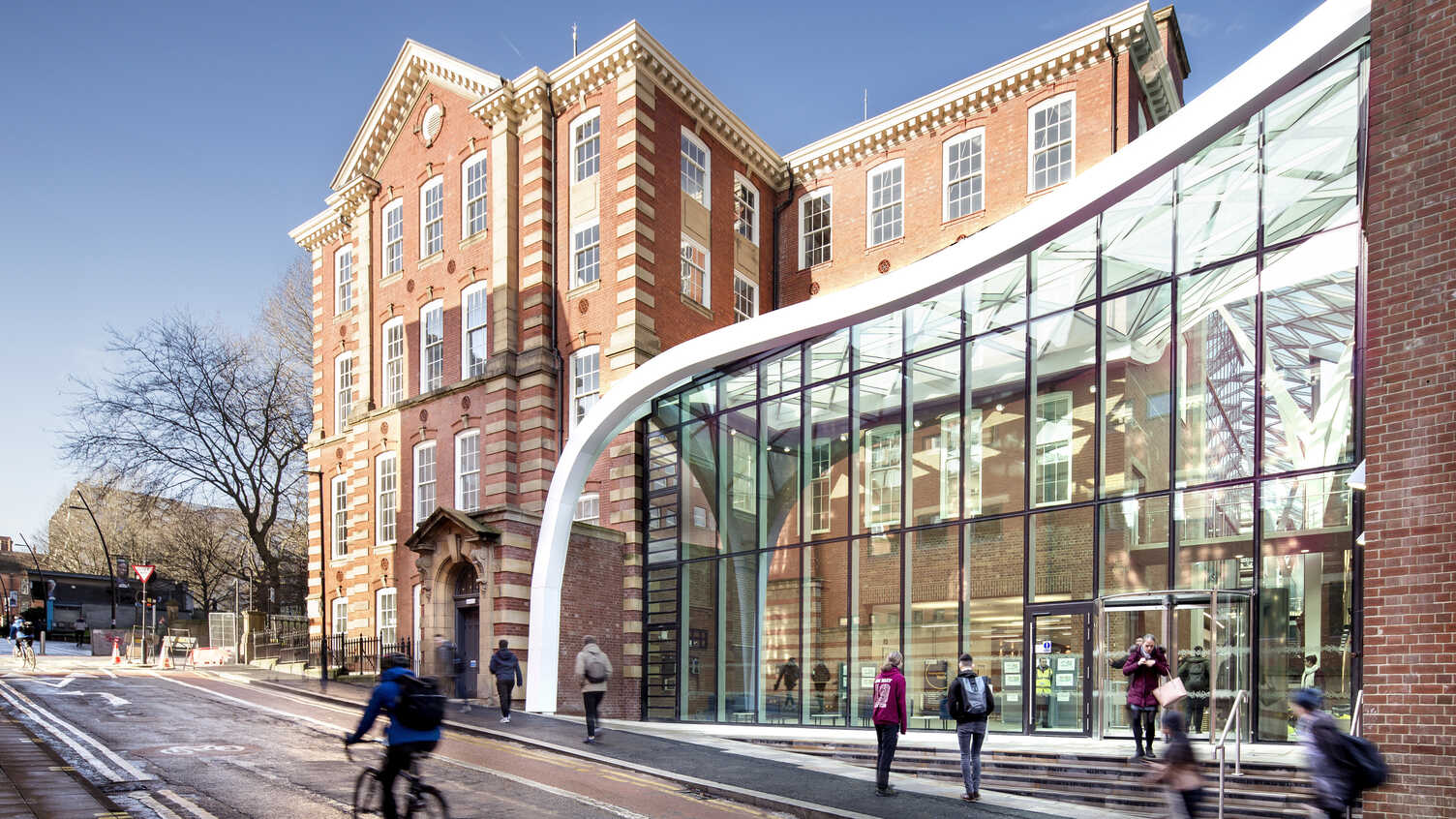 University of Sheffield Engineering Heartspace, combining historic brick buildings and a modern glass atrium